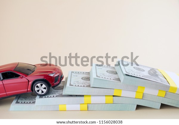 purchase auto dealership and rental car,
car loan buying a new car concept. red car
money