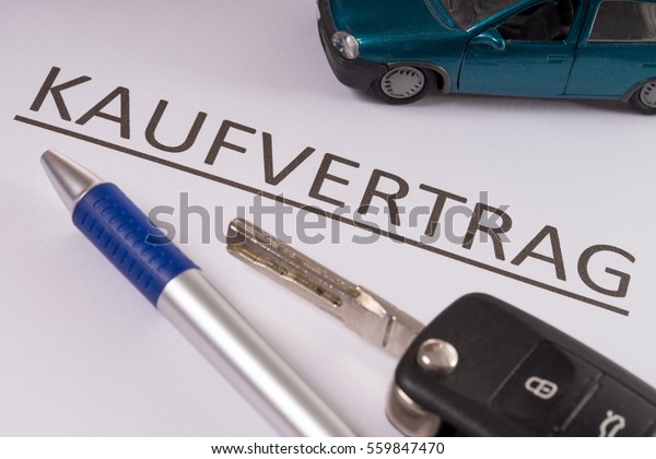 Purchase contract with pen
and car key