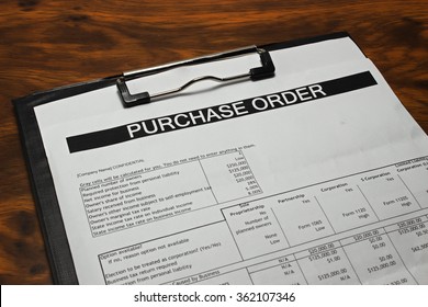 Purchase Order Form On Wooden Table