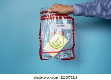 The Purchase Of A Product In An Airport Duty Free Packaged Sealed In A Transparent Safety Bag For Transport On The Plane