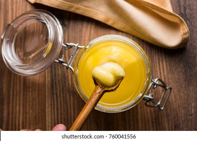 Pure OR Desi Ghee also known as clarified liquid butter. Selective focus