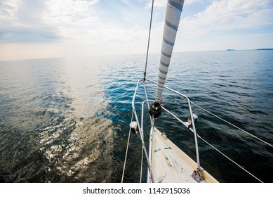 Pure morning light over he Baltic sea. A view from the sailboat's deck to the bow, Estonia - Shutterstock ID 1142915036