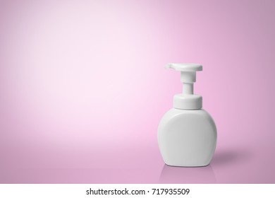 Pure White Plastic Pump Bottle With Shadow On Pink Background 