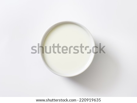 pure white view of bowl with milk