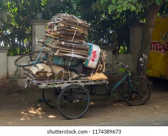 Puri, India - Circa January, 2018. View Of The Cart Full Of Paper Cardboard For Recycle In The Streets Of Puri.