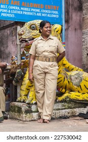 PURI, INDIA OCTOBER 9th 2010 An Indian Policewoman Stands Outside The Temple Of Jagannatha In Puri.