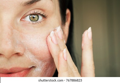 purification of the face. girl washed with scrub to clean the pores. - Shutterstock ID 767886823