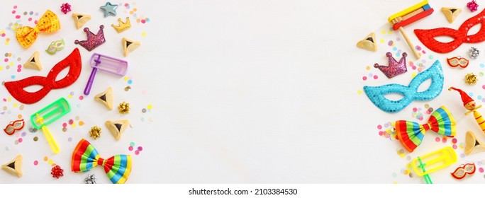 Purim Celebration Concept (jewish Carnival Holiday) Over Wooden White Background. Top View, Flat Lay