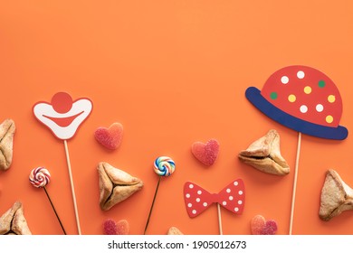 Purim Celebration Concept On Orange Background With Copy Space.