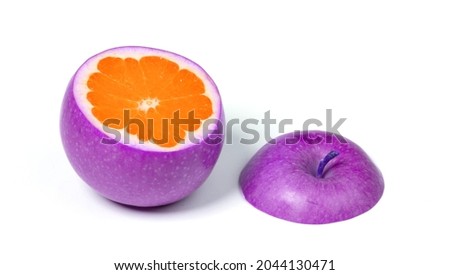 Purple apple with orange inside, isolated on white