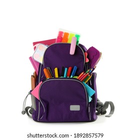 Purple backpack with different school stationery on white background - Shutterstock ID 1892857579