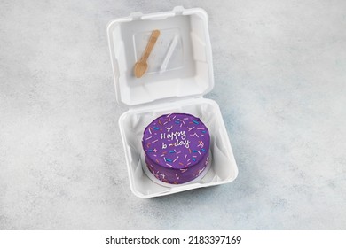 Purple Bento Cake. A Small Cake In A Lunchbox On A White Concrete Background. Birthday Cake. Asian Food Trend. Cute Gift For Any Holiday. Copy Space