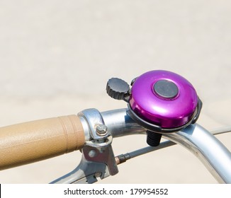 purple bicycle bell