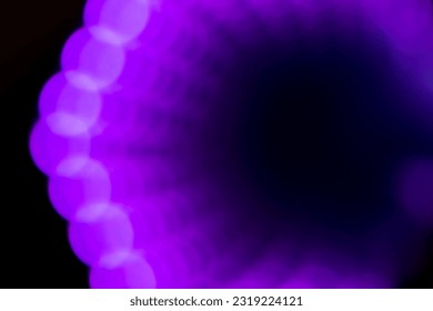 Purple and black abstract dot geometric lightburst pattern