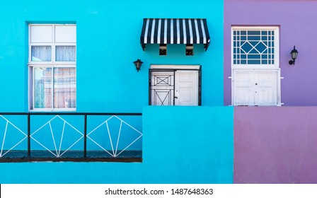 Purple and blue facade with doors and windows in the colorful malay district of Bo Kaap in Cape Town, Western Cape province, South Africa.