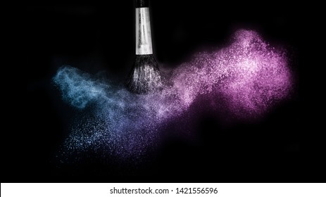 purple and blue ocean powder color splash and brush for makeup artist or graphic design in black background, look like a lively and joyful mood.