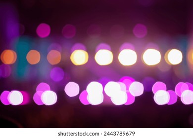 Purple bokeh festive abstract background. Blurred. Festive purple bokeh background, perfect for celebrations. Celebration, festivity, abstraction, atmosphere. Out of focus.