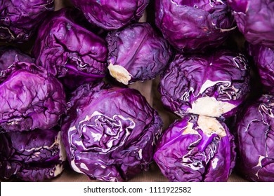 Purple cabbages stacked at a farmers' market - Powered by Shutterstock