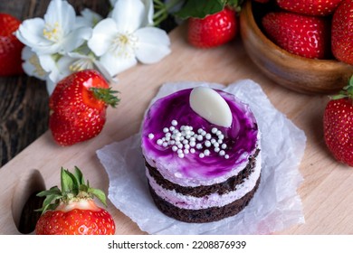 Purple Cake With Berry Flavor, Sweet Dessert Cake With Red Strawberries