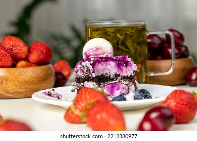 Purple Cake With Berry Flavor, Sweet Dessert Cake With Red Strawberries