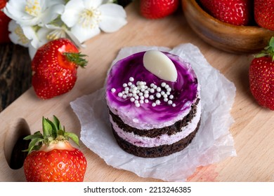 Purple Cake With Berry Flavor, Sweet Dessert Cake With Red Strawberries