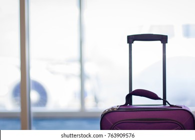 purple carry on luggage