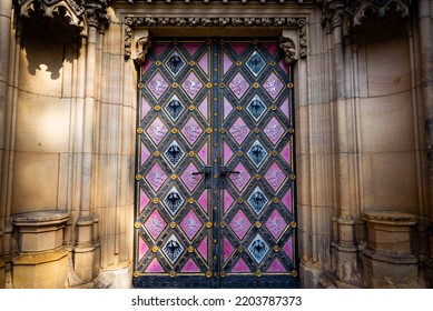 Purple Cathedral Doors With Ornaments In Prague, Czech Republic