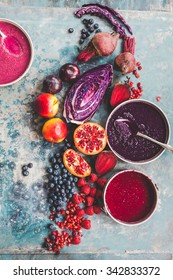 Purple color food collage. Pomegranate grapefruit raspberries, blueberries beet smoothie recipe. Mix vegan acai bowl food concept. rustic style.
