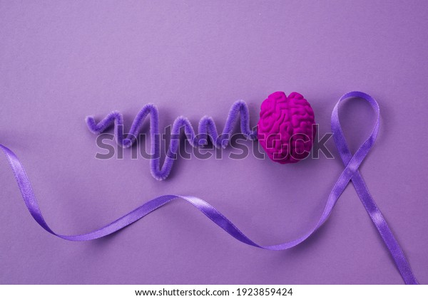 Purple day. Epilepsy awareness day. Awareness\
Purple ribbon