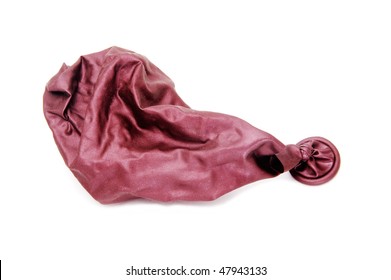 Purple Deflated Balloon Isolated On A White Background