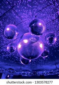 Purple Disco Balls At Roller Rink