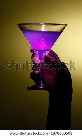 
purple drink in yellow background