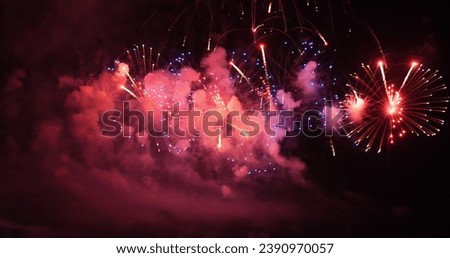 Purple Firework celebrate anniversary happy new year 2024, 4th of july holiday festival. Purple firework in night time celebrate national holiday. Violet firework Countdown to new year 2024 festival