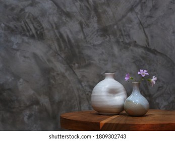 Purple flowers in white vase In a coffee shop A beautiful decoration Looks and feels refreshed. Soft focus and background blur - Shutterstock ID 1809302743