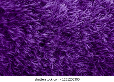 Purple fur texture. Violet glamorous background.   - Shutterstock ID 1251208300