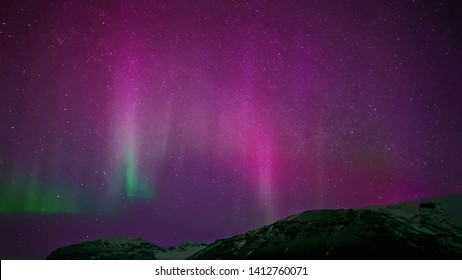 The Purple Glow Of The Northern Lights