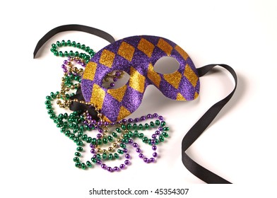 Purple And Gold Venetian Mask With Green, Gold, And Purple Mardi Gras Beads