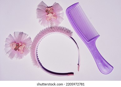 Purple Hair Comb And Floral Headband.  White Background