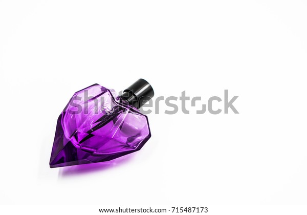 purple heart shaped perfume bottle