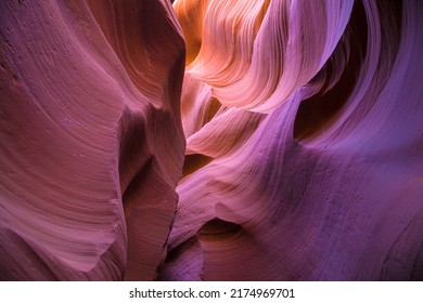 Purple Hues On The Walls Of Lower Antelope Canyon, Arizona, United States.