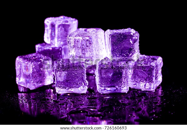 Purple Ice Cubes On Black Table 