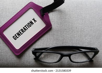 Purple ID Card And Reading Glasses With Text GENERATION X, Concept Of Demographic Group People Who Born 1965-1979 Now In Midlife 40-56 Yrs Old, Prefer Work Life Balance And Still Digitally Savvy