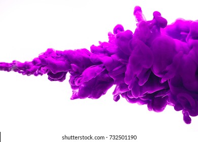 Purple Ink In Water Isolated On White Background.