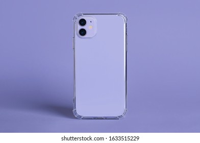 Purple IPhone 11 12 In Clear Silicone Case Back View Isolated On Purple Background. Phone Case Mockup Very Peri 2022 Color