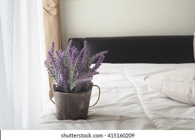 Purple Lavender Flower On Bed At Bedroom.