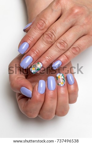 purple, lilac manicure with painted daisies on short square nails