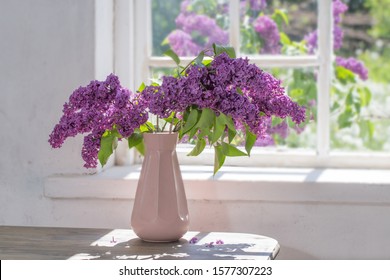 purple lilac in vase