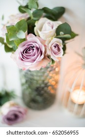 Purple, Mauve Color Fresh Summer Roses In Vase With White Wall B