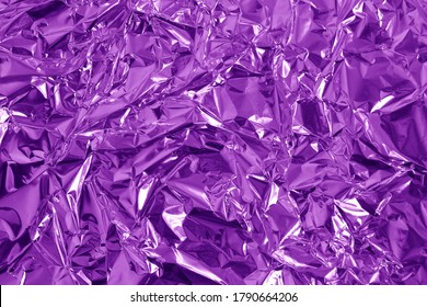 Purple Metallic Foil Shiny Texture, Wrinkled Wrapping Paper For Background And Design Art Work.