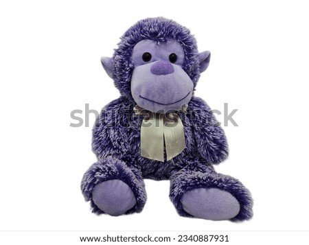 Purple monkey doll isolated on white background